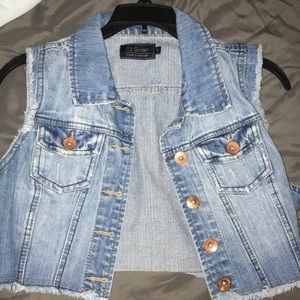 Cropped, sleeveless light wash jean vest